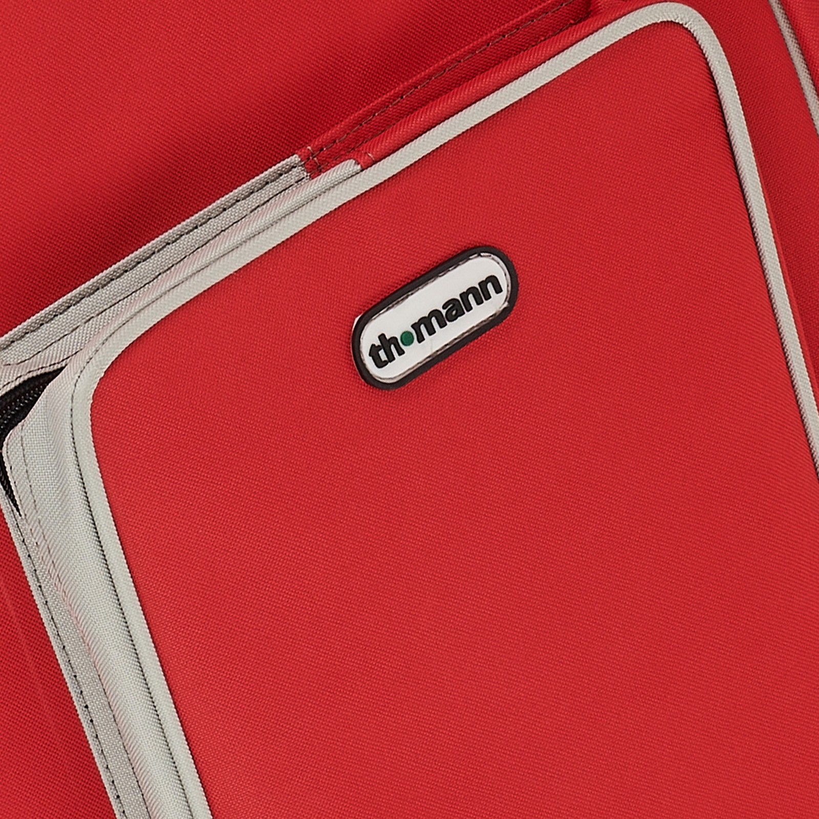 Thomann-Logo auf der Thomann E-Gitarren Tasche red