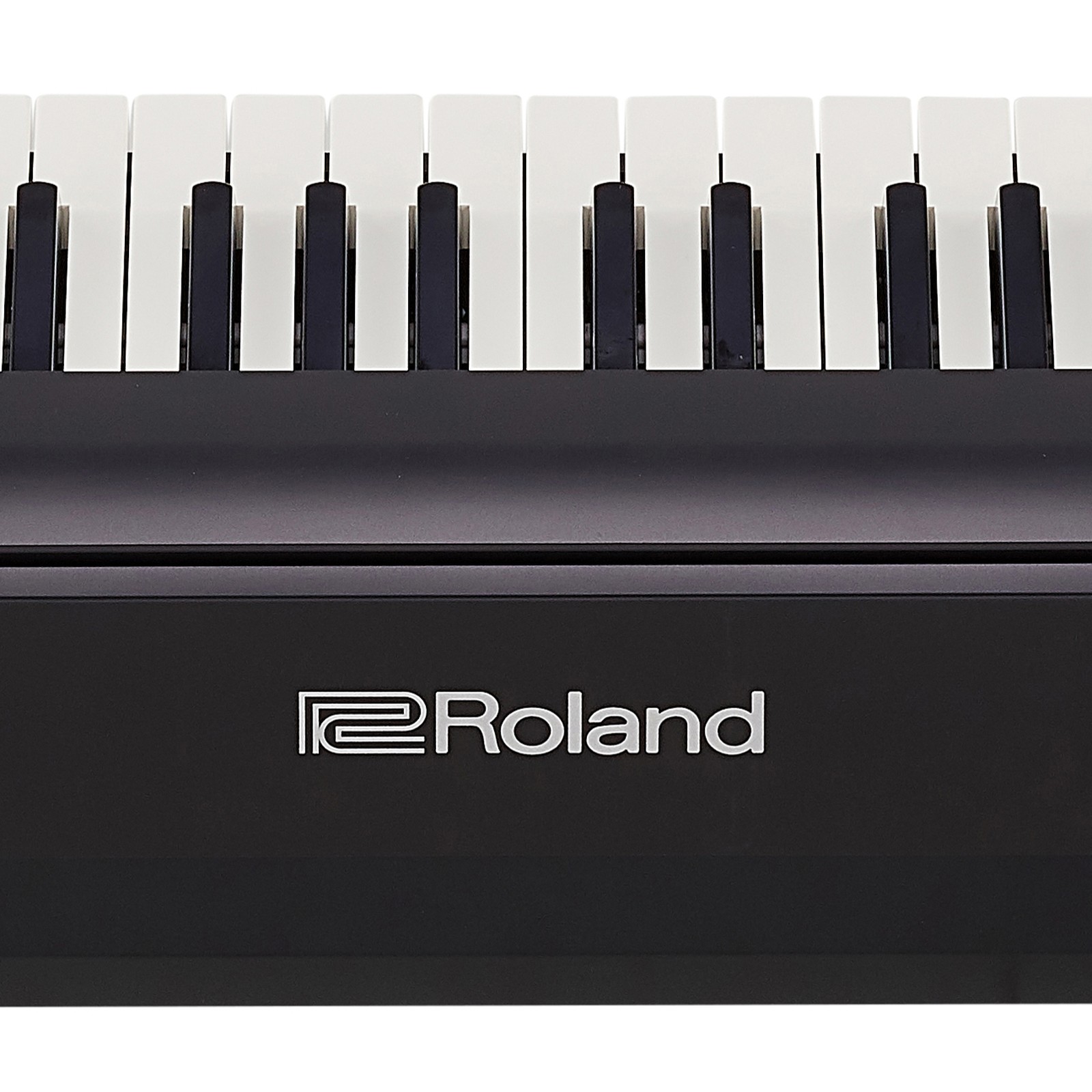 Rear side of digital piano with Roland logo