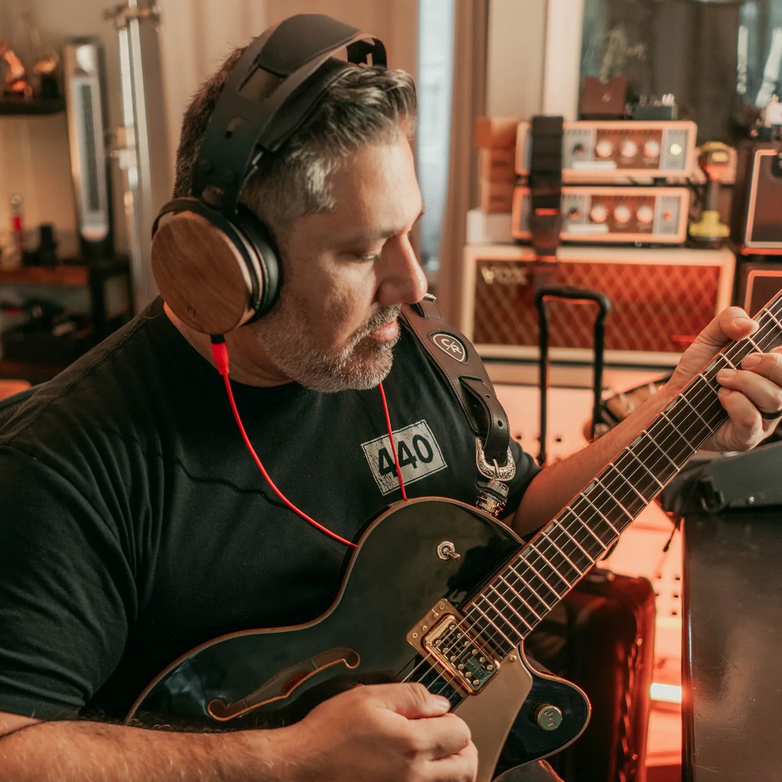 Chris Rocha, playing guitar and using the Ollo Audio R1 1.0