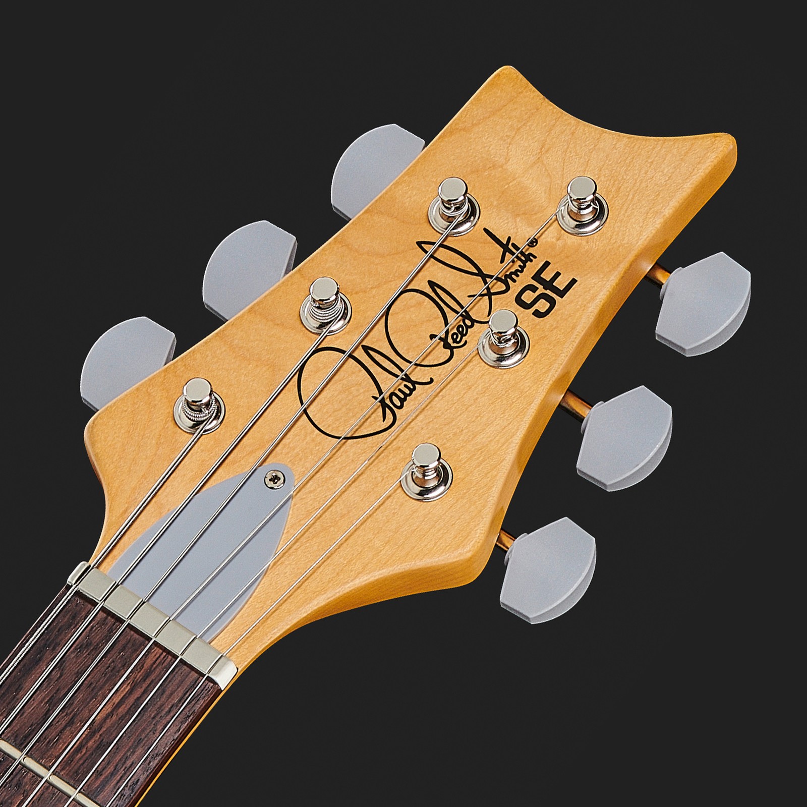 headstock and chrome tuners with the Paul Reed Smith SE logo
