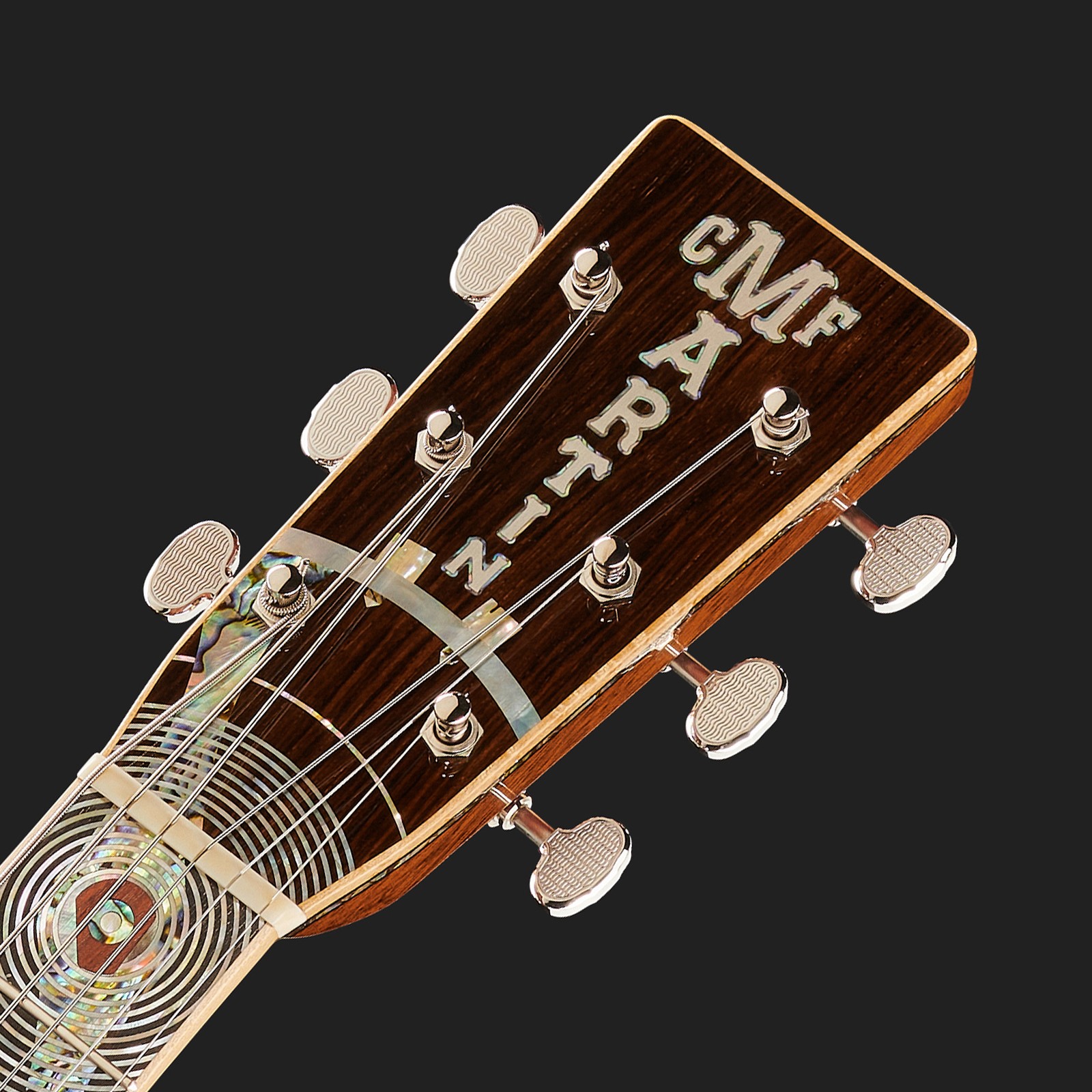 Decorated Martin Guitars headstock with stainless steel machine heads