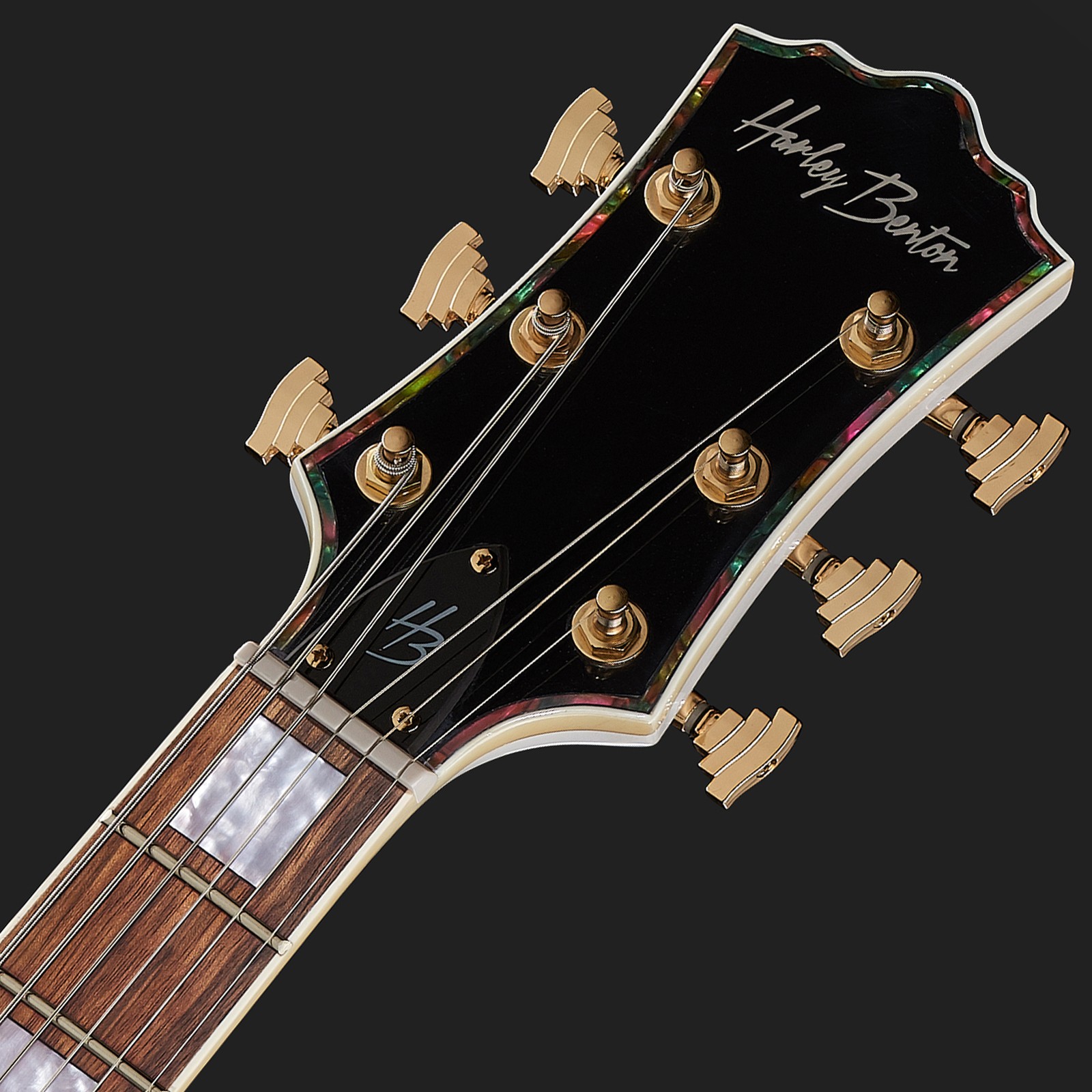 Headstock featuring the Harley Benton logo and block inlays on the fingerboard