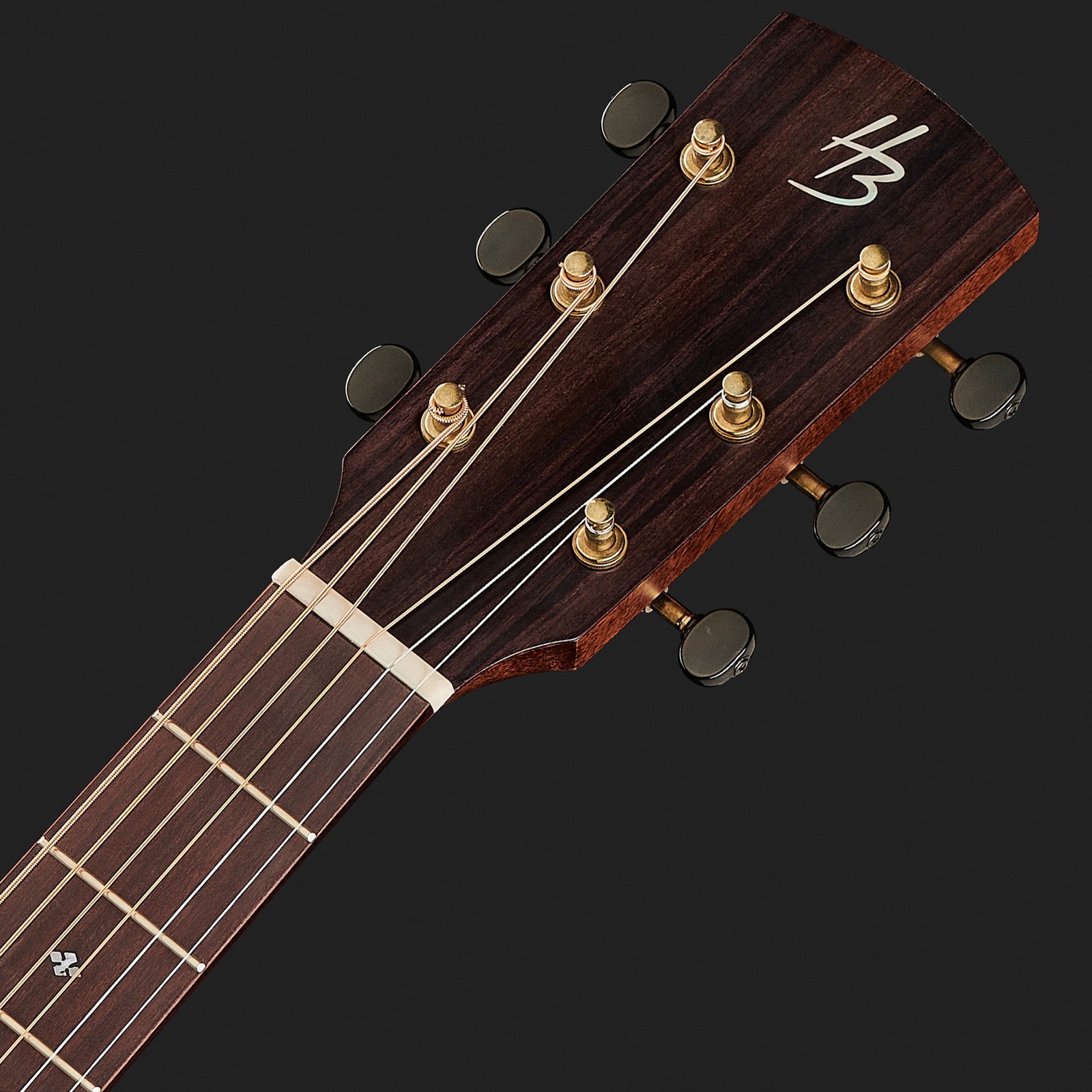 Headstock with open machine heads