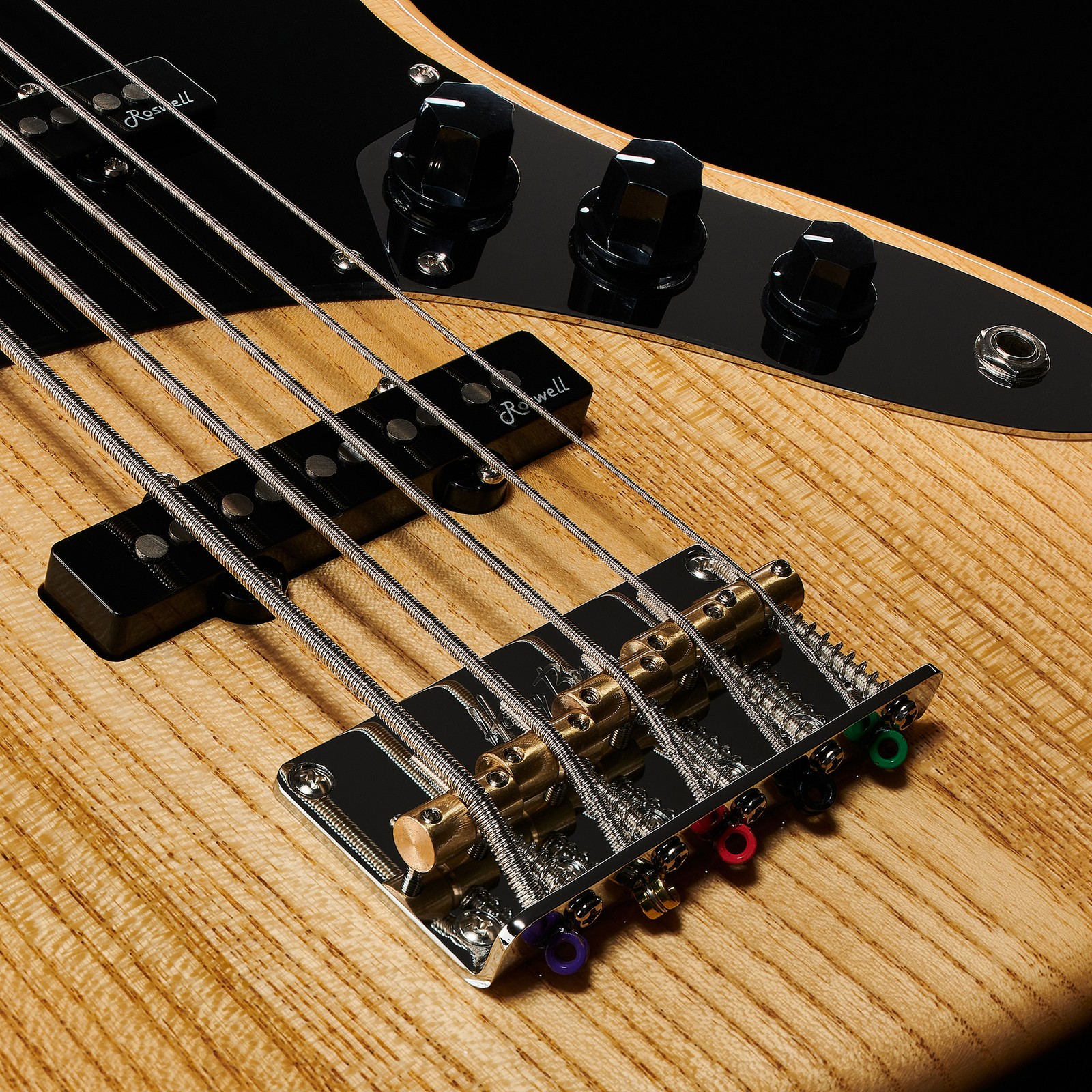 Bridge detail of the Harley Benton JB-75-5MN NA Vintage Series five-string bass guitar