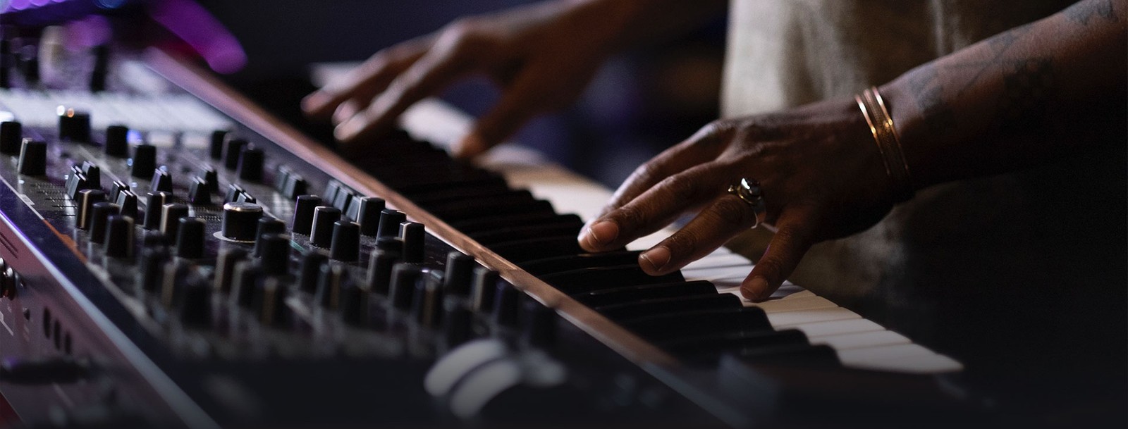 Musician playing the Arturia PolyBrute Controls and buttons on the Arturia PolyBrute analogue synthesizer