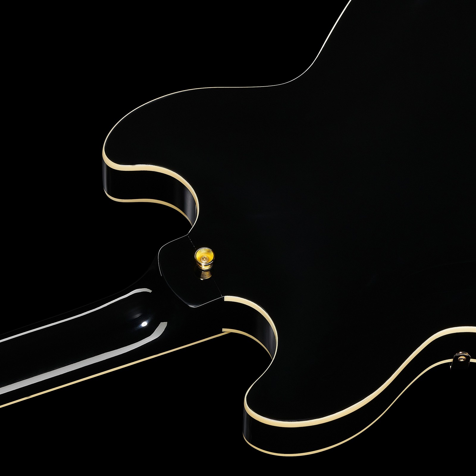 golden strap button on the back of the Harley Benton HB-35Plus Black