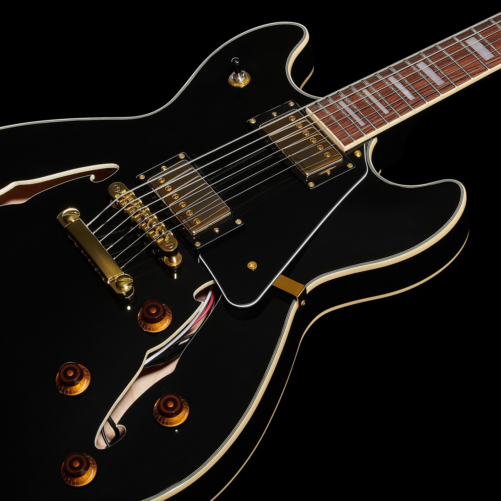 gold hardware and humbuckers on the Harley Benton HB-35Plus Black