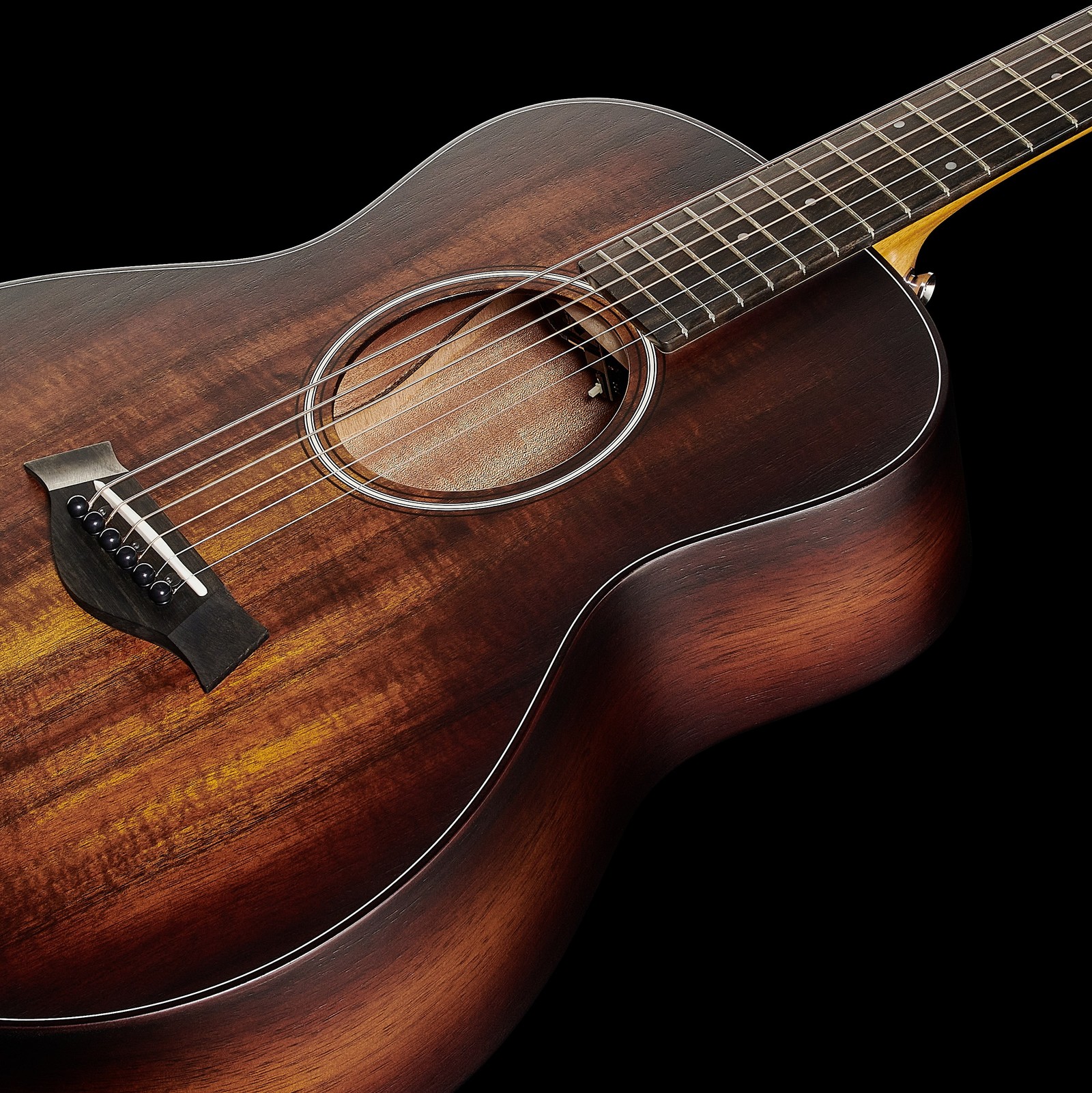 Closeup of the Taylor GS Mini-e Koa Plus Acoustic Guitar with Pickup