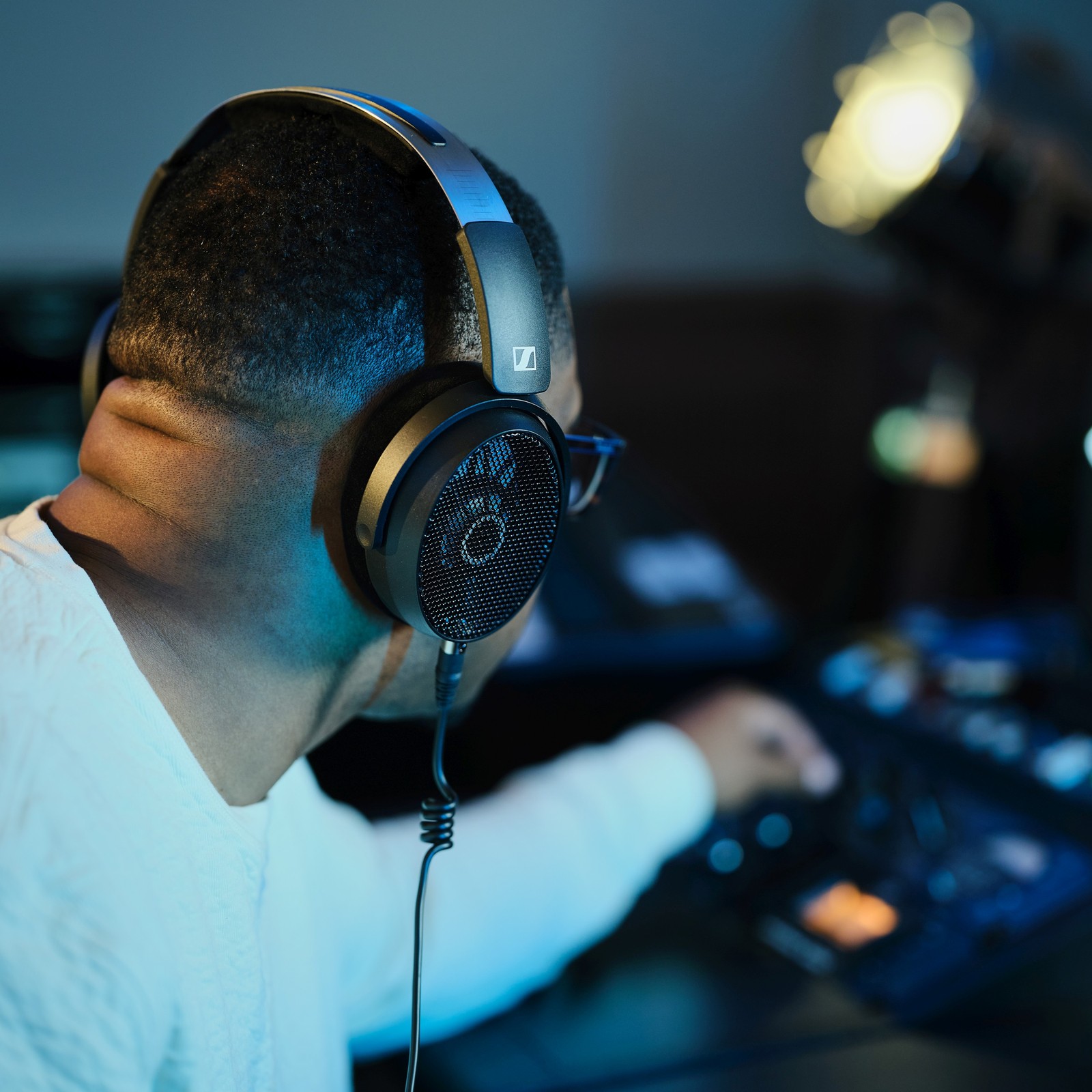 Man wearing Sennheiser HD-490 PRO headphones in the studio