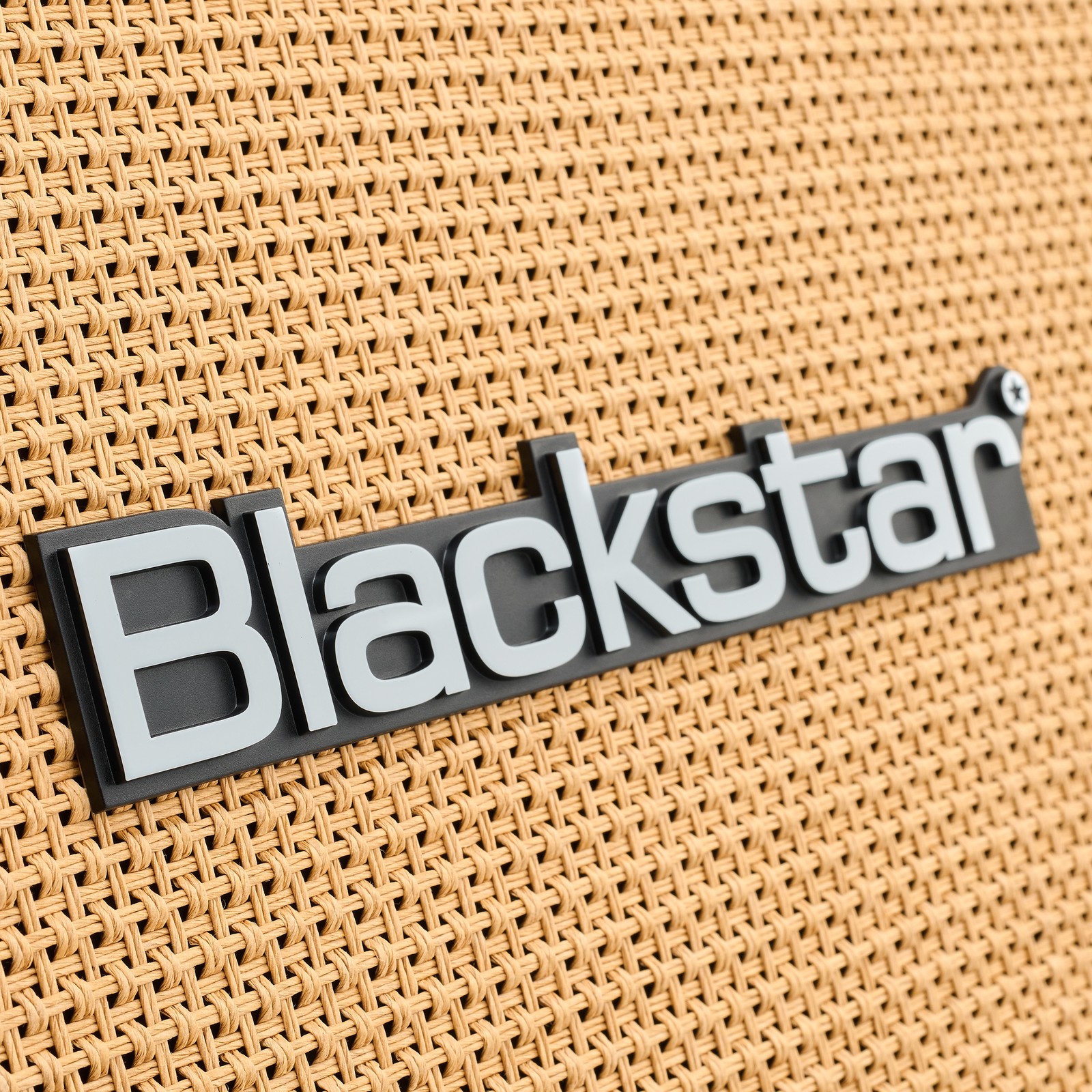 Strohfarbene Frontbespannung des Blackstar Debut 212V 2x12 Box Black