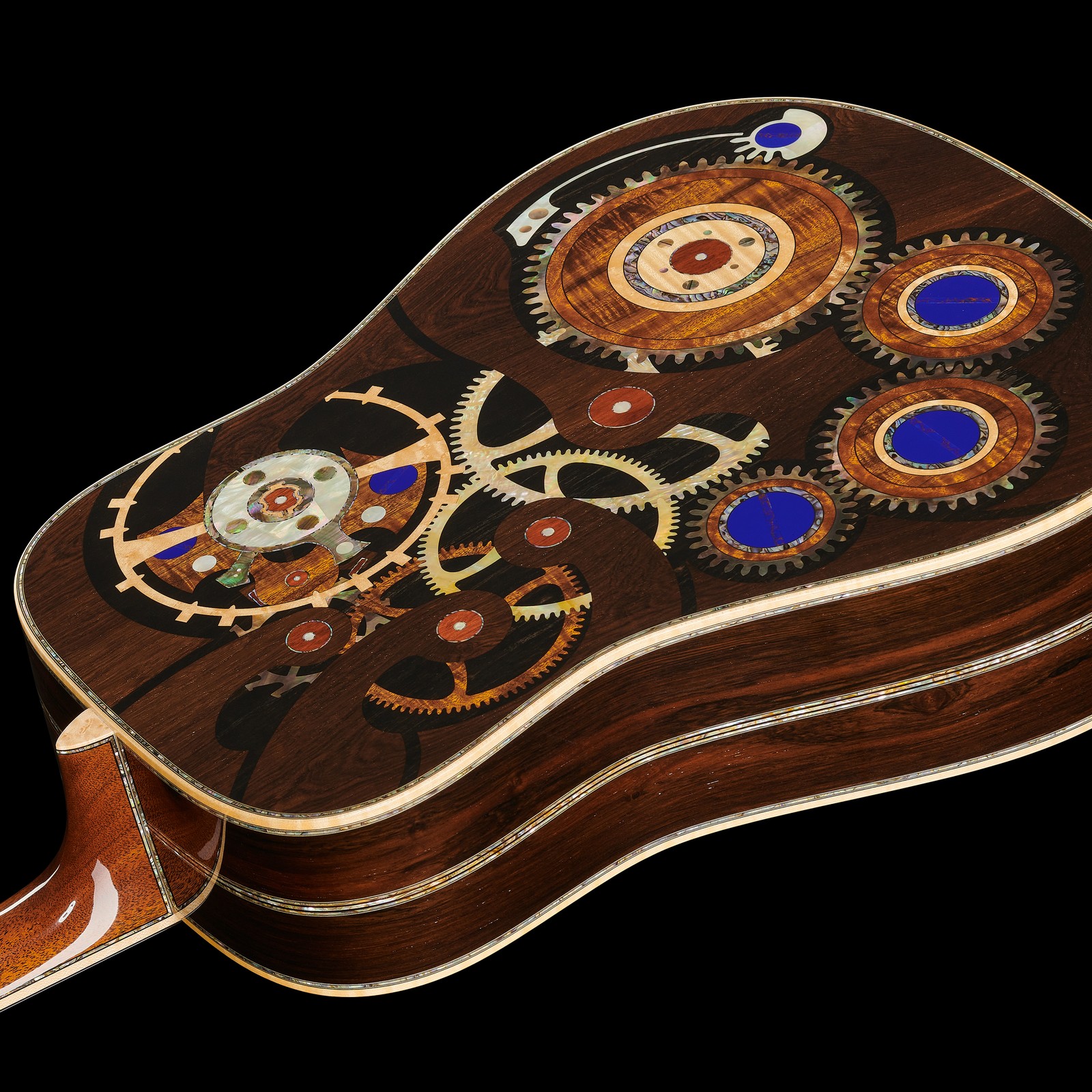 Brazilian rosewood body with clockwork gear inlays