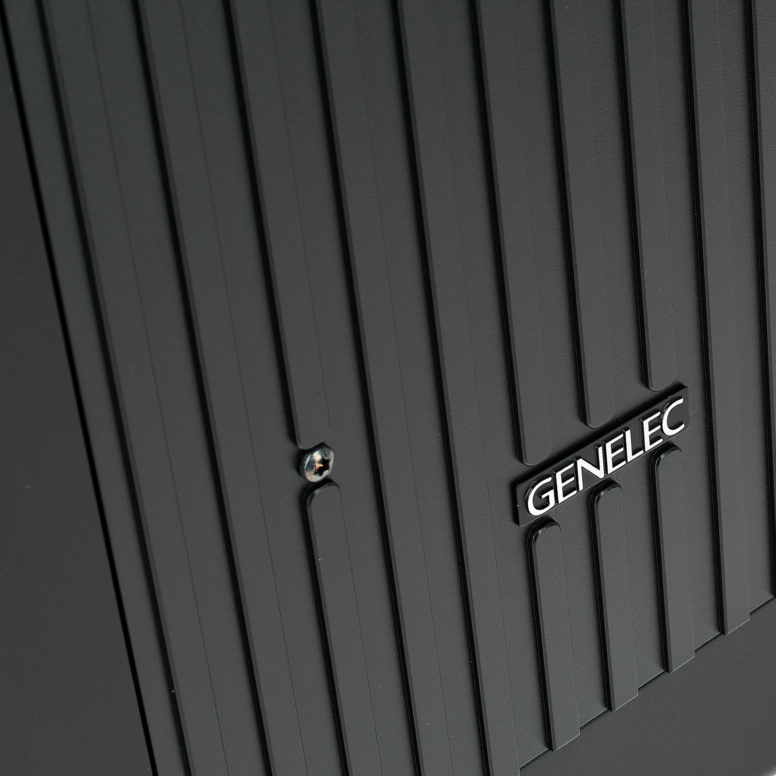 Manufacturer logo on the front of the Genelec 7380 APM subwoofer