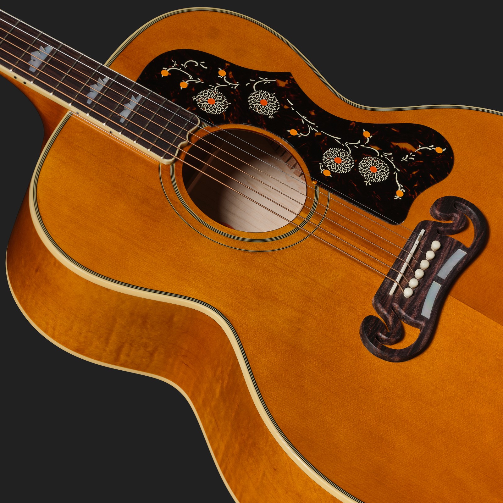 Vintage pickguard on the Epiphone 1957 SJ-200 Reissue AN IBC, acoustic steel-string