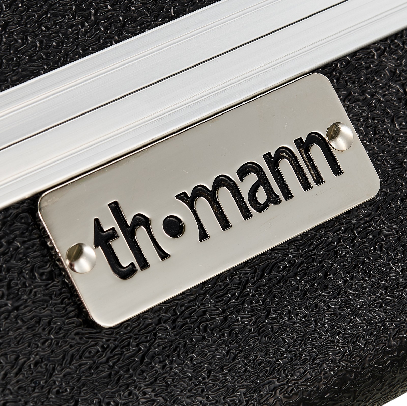 Thomann logo on the front of the case