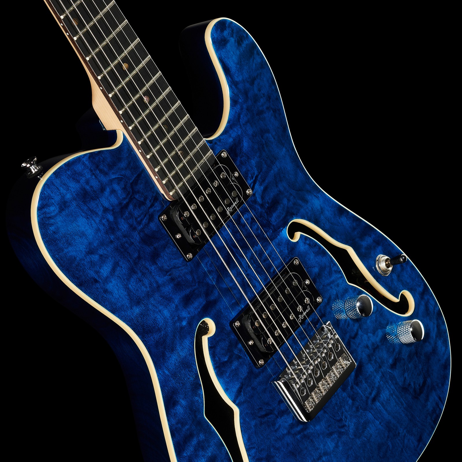 Humbucker und Griffbrett der Harley Benton TE-90QM HH Trans Blue
