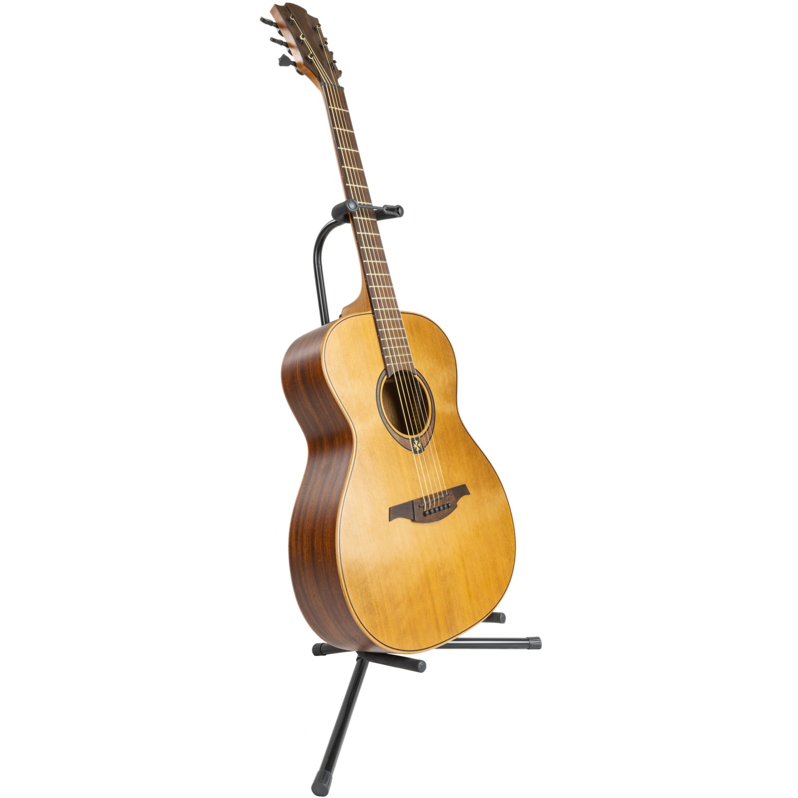 Guitare western sur un stand de guitare Millenium