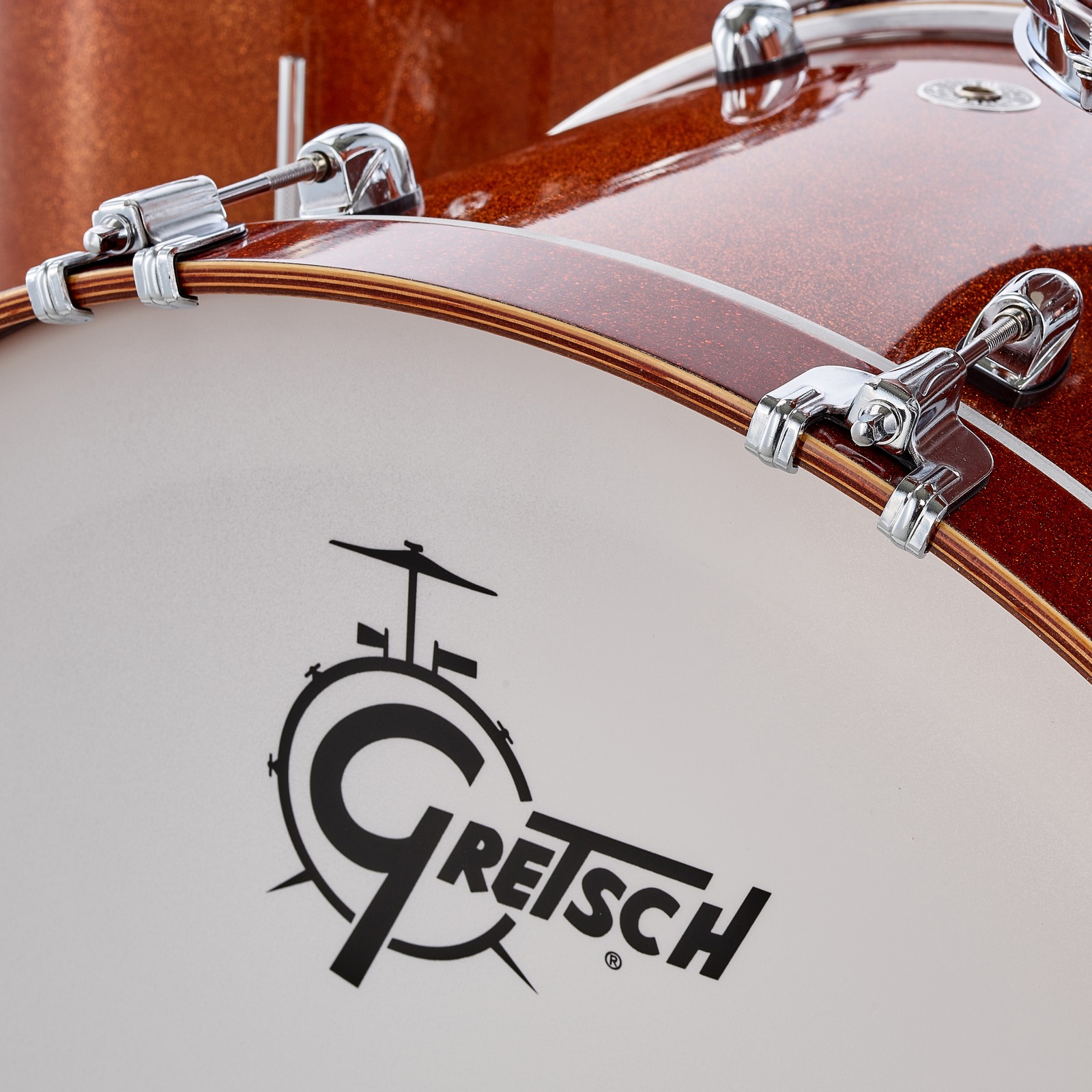 White bass drum resonant head with Gretsch logo