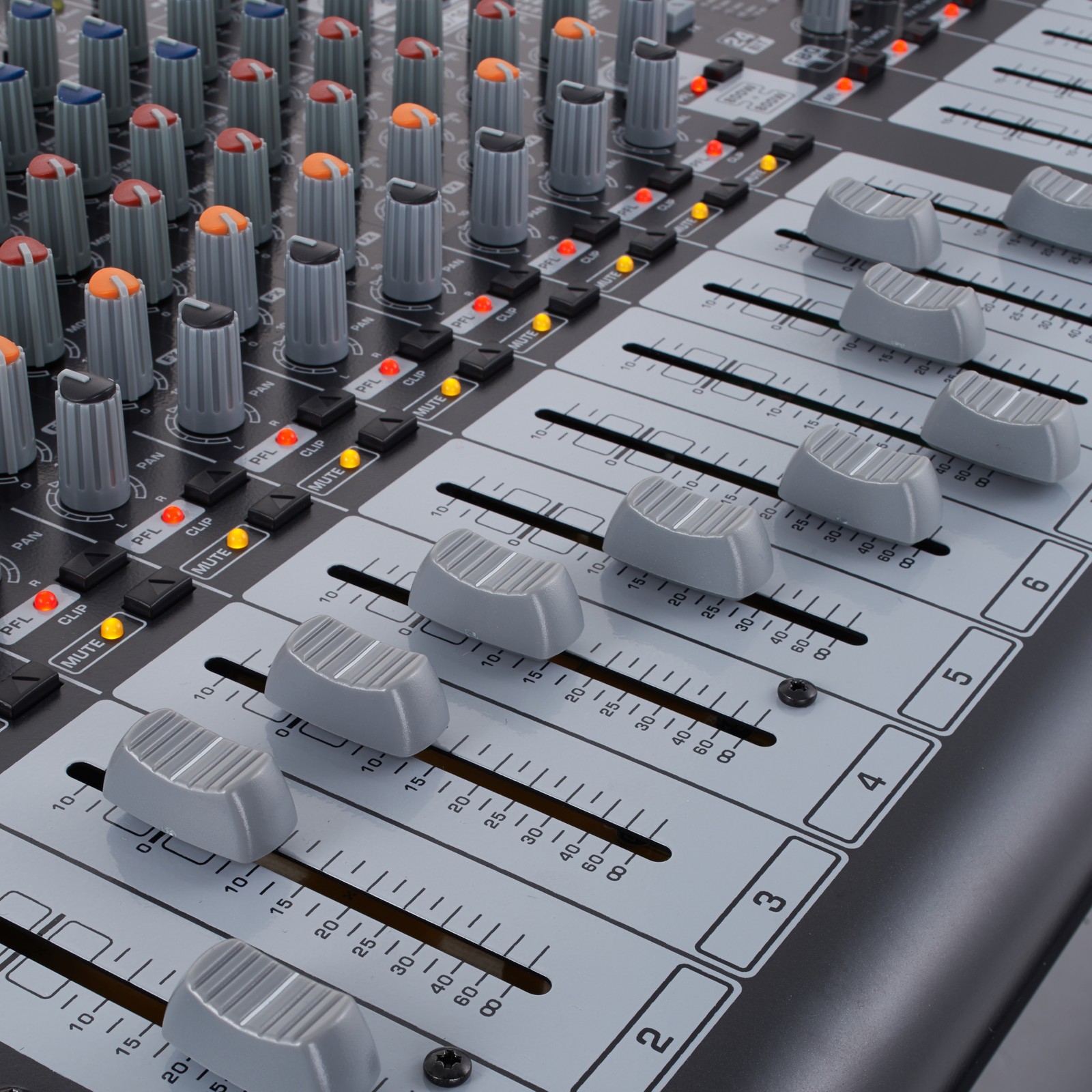Faders on the Behringer PMP4000 powered mixer