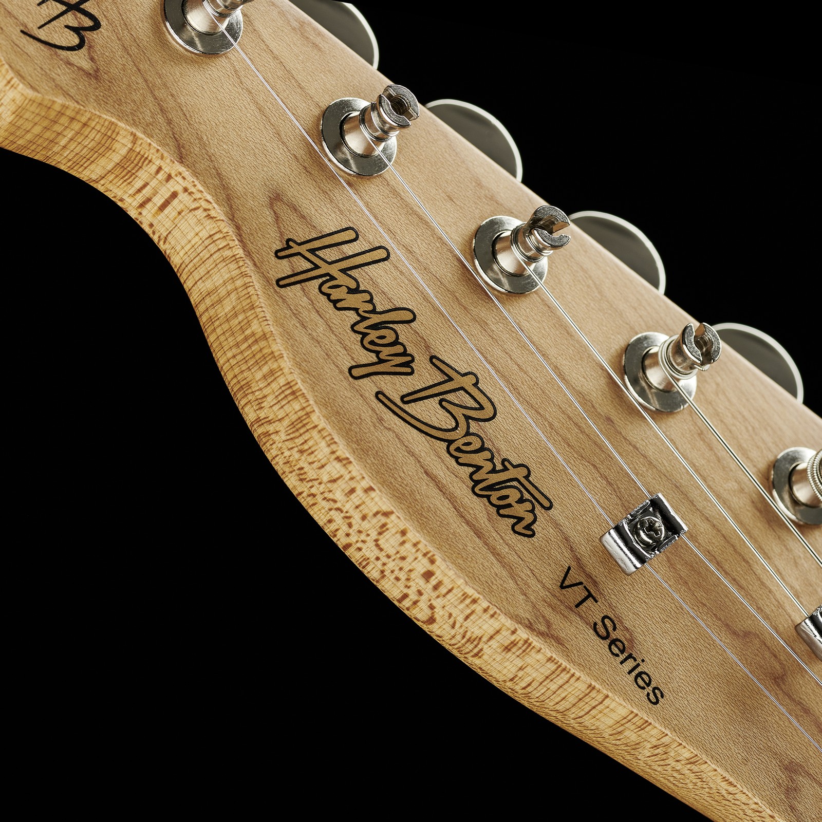 Harley Benton logo on the headstock of the left-hand electric guitar