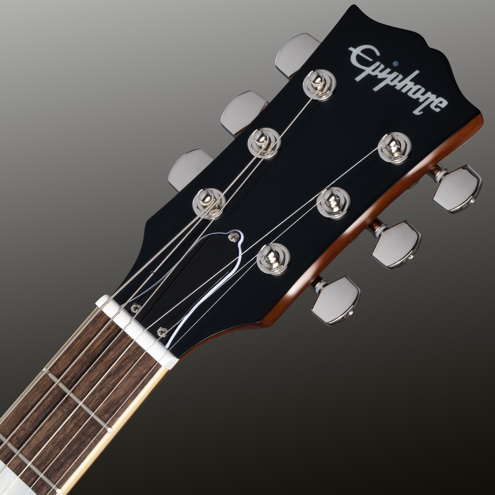 Epiphone headstock in Gibson's Open Book style