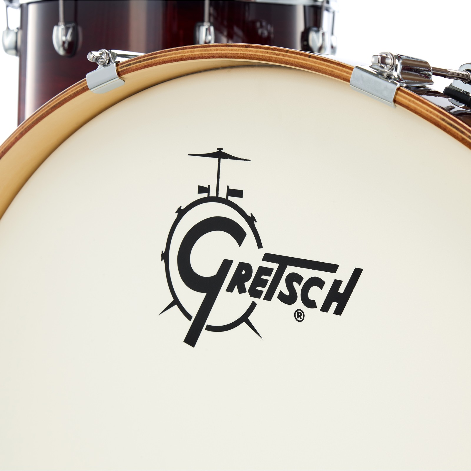 White bass drum resonant head with Gretsch logo